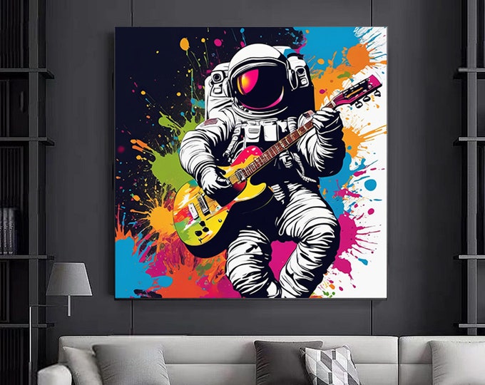 DJ astronaut graffiti wall art with headphones and playing guitar. Astronaut canvas print.