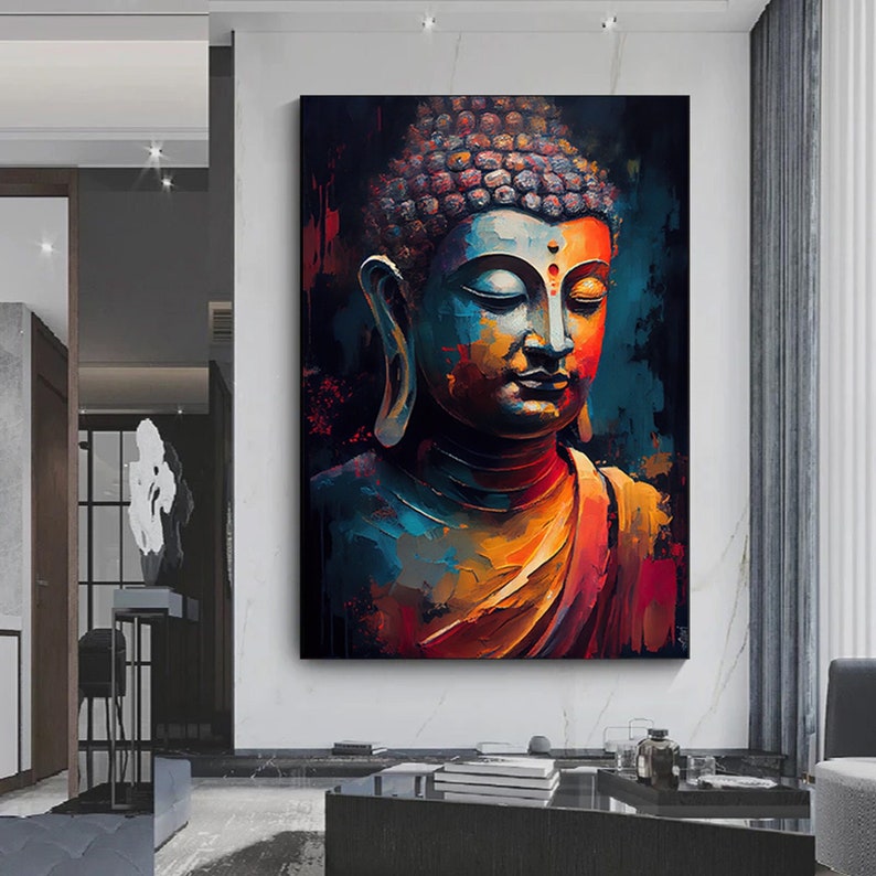 Peut inclure: Une peinture abstraite color&eacute;e du visage de Bouddha. La peinture pr&eacute;sente des nuances de bleu, d'orange, de rouge et de jaune. L'arri&egrave;re-plan est bleu fonc&eacute;.