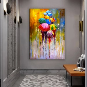 May include: A colorful abstract painting of people walking in the rain with umbrellas. The umbrellas are various colors, including red, yellow, blue, green, and purple. The background is a blurred yellow and blue.