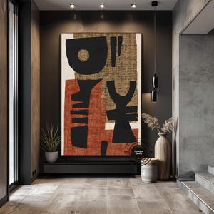 May include: Large abstract canvas art with black, rust, and gold geometric shapes. The artwork features a mix of organic and structured forms, creating a modern and stylish aesthetic. The piece is displayed in a contemporary interior setting.