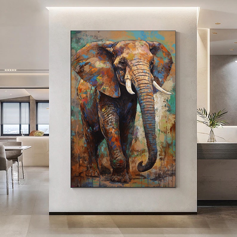 Puede incluir: Una pintura abstracta colorida de un elefante con un fondo texturizado. El elefante est&aacute; pintado en tonos de marr&oacute;n, azul y verde. El fondo es una mezcla de marr&oacute;n, azul y verde.