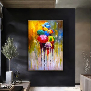 May include: A colorful painting of people walking in the rain with umbrellas. The umbrellas are red, yellow, green, blue, and purple. The background is a blurred yellow and green.