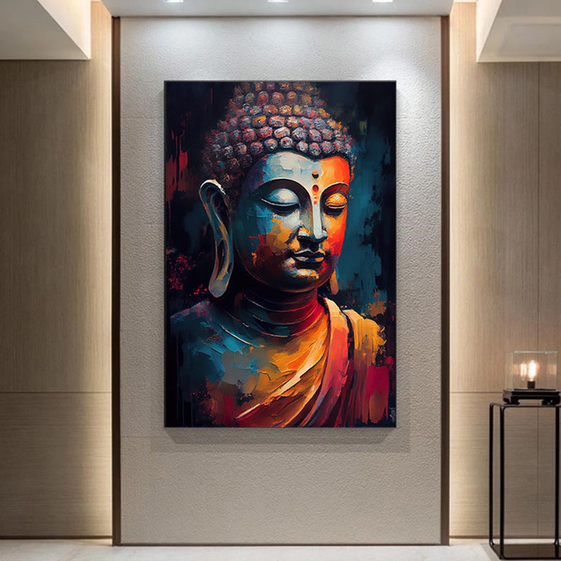 Peut inclure: Une peinture color&eacute;e de Bouddha sur un fond bleu, orange et rouge. La peinture est de style moderne et pr&eacute;sente un gros plan du visage de Bouddha.