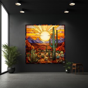 May include: A stained glass artwork depicting a desert landscape with a large sun setting behind a cactus and mountains. The artwork is in shades of orange, yellow, green, and blue.