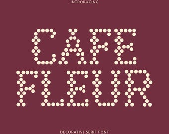 May include: A graphic design display on a dark maroon background featuring the word INTRODUCING at the top, the text CAFE FLEUR in the center composed of cream-colored dots, and the text DECORATIVE SERIF FONT at the bottom in cream lettering.