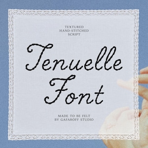 May include: A square white fabric piece with a lace border featuring the black embroidered text "TEXTURED HAND-STITCHED SCRIPT", "Tenuelle Font", and "MADE TO BE FELT BY GAFAROFF STUDIO" in a cursive style, presented on a solid blue background.