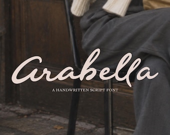 May include: The text Arabella is displayed in a large, light pink, handwritten script font. Below this, the text A HANDWRITTEN SCRIPT FONT is written in a smaller, white, sans-serif font. The background shows a person wearing dark trousers.