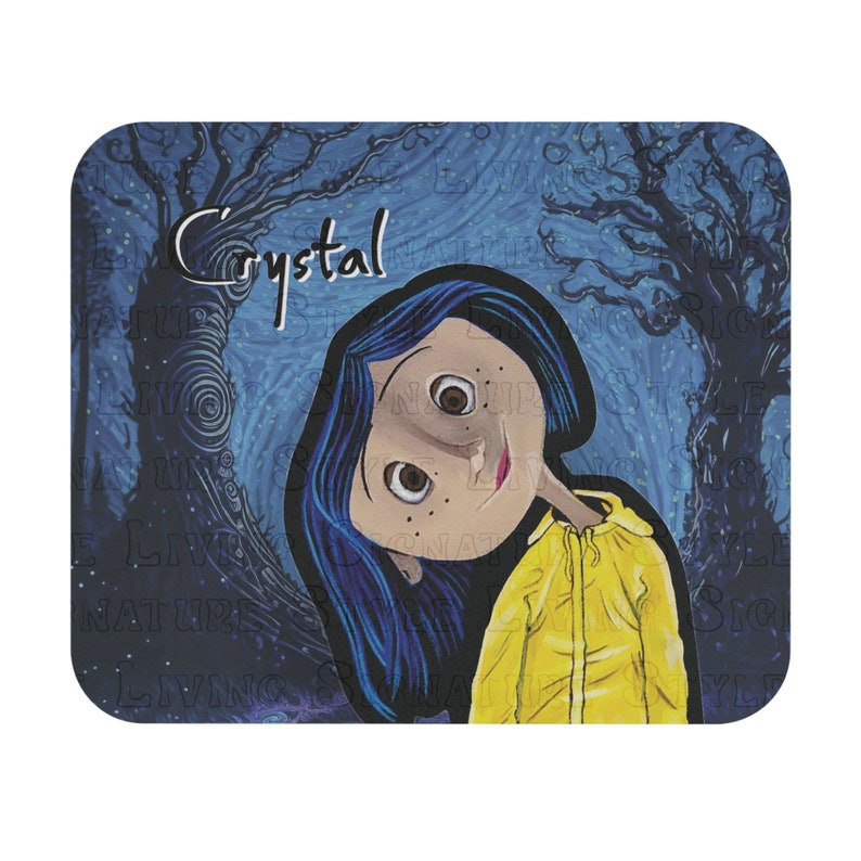 May include: A mouse mat with a cartoon illustration of a girl with blue hair and a yellow jacket. The word "Crystal" is written in white script above the girl's head. The background is a dark blue forest scene.