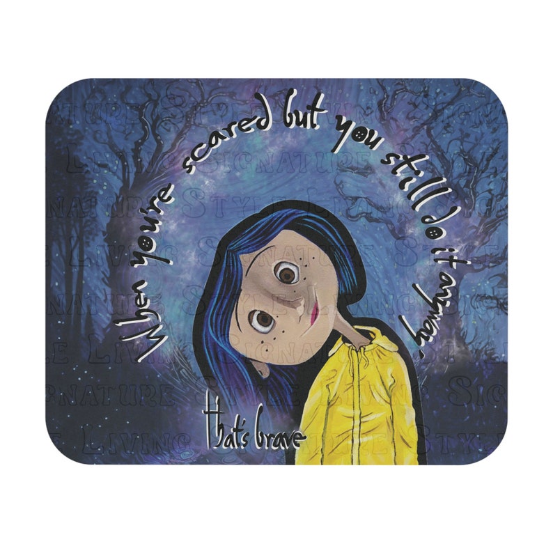 May include: A rectangular mousepad with an illustration of a girl with blue hair and a yellow jacket. The text "When you're scared but you still do it anyway. That's brave" is written around the girl.