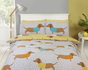 Dolly Dachshund Single. Bright and fun Dolly Dachshund duvet cover features cute sausage dogs on a yellow polka dot background