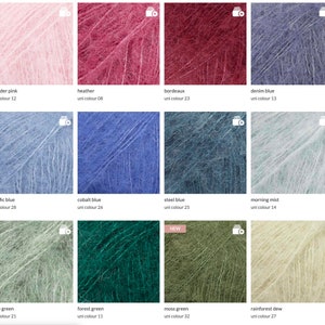 May include: A collection of yarn samples in various colors, including pink sand, powder pink, heather, bordeaux, denim blue, light lavender, sweet orchid, pacific blue, cobalt blue, steel blue, morning mist, light sea green, pistachio ice cream, sage green, forest green, moss green, rainforest dew, and black.