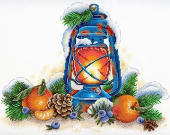May include: A blue lantern with a red flame inside, surrounded by snow-covered pine branches, oranges, blueberries, and a pine cone.