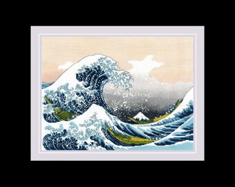May include: A blue and white cross-stitch embroidery of a large wave crashing over a smaller wave, with a mountain in the background. The wave is depicted in a traditional Japanese style.
