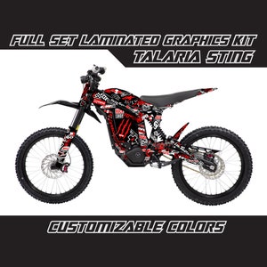 May include: Full set of laminated graphics for a Talaria Sting electric dirt bike. The graphics feature a black and red colour scheme with a graffiti-style design. The graphics are customizable.