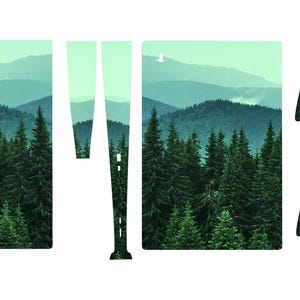 May include: A set of controller skins featuring a scenic mountain and forest design. The skins include pieces for the controller body, buttons, and touchpad, with a layered image of evergreen trees and distant mountains in shades of green and blue.