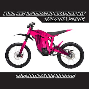 May include: Pink and black electric dirt bike with a camouflage pattern. The bike is called "Talaria Sting" and has customizable colours. Full set laminated graphics kit.