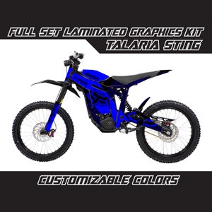 May include: Full set of laminated graphics for a Talaria Sting electric dirt bike. The graphics are blue and black with a stylised fox design. Customizable colours are available.