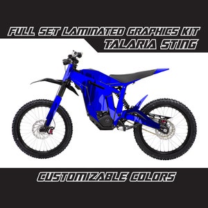 May include: Full set laminated graphics kit for a Talaria Sting electric dirt bike. The graphics are blue and black with a camouflage pattern. Customizable colours are available.