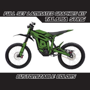 May include: Green and black electric dirt bike with custom graphics. The graphics feature a star and the words "Talaria Sting", "Sleep", "Hard", "Ride", "Brothers", and "Caffeine".