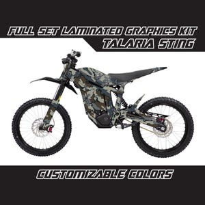 May include: Full set laminated graphics kit for a Talaria Sting electric dirt bike. The graphics feature a camouflage pattern with black, green, and brown colors. Customizable colors are available.