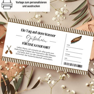 May include: A printable gift certificate for a canoe trip. The certificate has a brown and white striped background with the text "Ein Tag auf dem Wasser Gutschein FUR EINE KANUFAHRT".