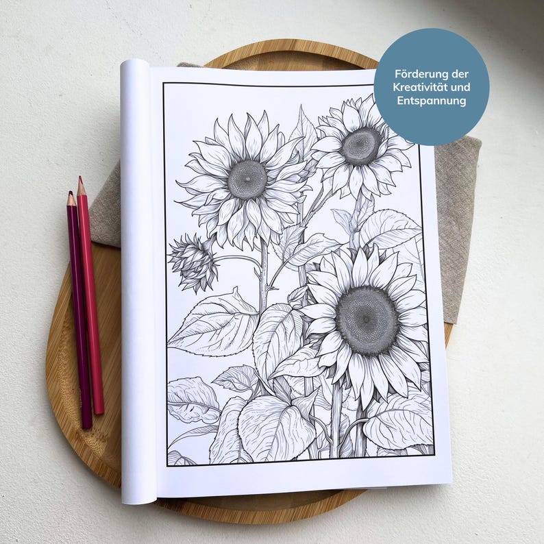 May include: A black and white coloring book page featuring a detailed illustration of three sunflowers with leaves. The text "F&ouml;rderung der Kreativit&auml;t und Entspannung" is printed in a blue circle at the top of the page.