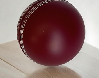 Pelota antiestrés de críquet para apretar (7 cm)