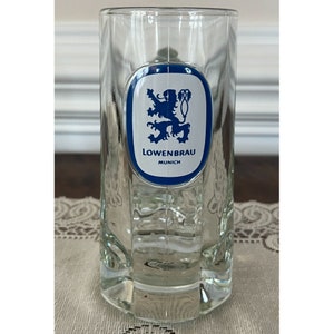 Vintage Lowenbrau Munich Glass Beer Mug with thumb rest. 250 ml capacity