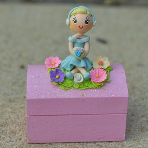 Wooden jewelry box or multipurpose box decorated with moldable paste