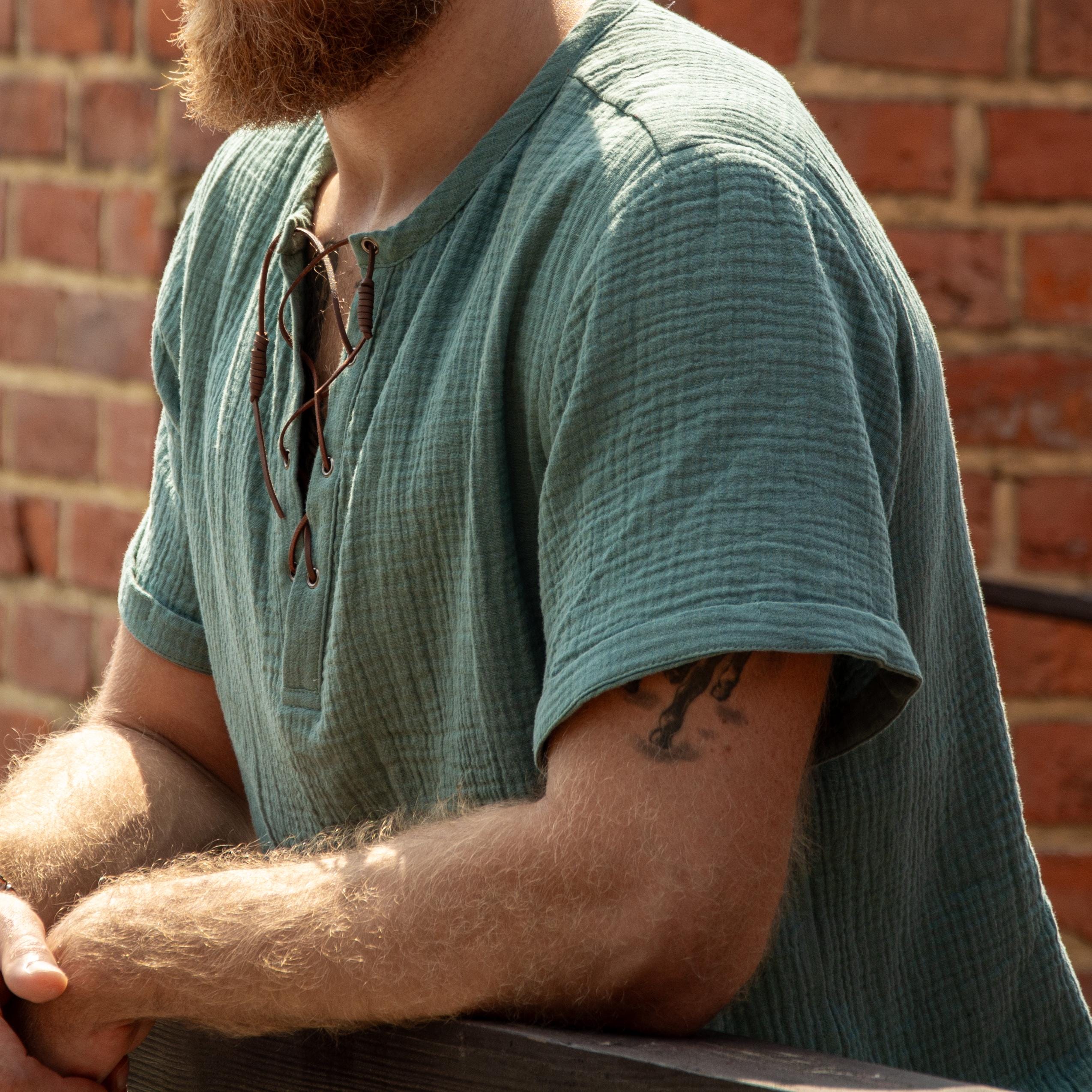 Viking style men's muslin t-shirt. Shirt made of natural fabric with ties.
