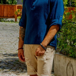Mens muslin shirt for summer in blue color. Comfortable mens shirt for summer made of muslin (cotton). A cotton summer shirt is the perfect gift for a father, son, boyfriend or friend.