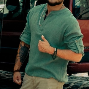 Men's Green cotton shirt made of pleasant eco-muslin with coconut buttons. Summer elegant shirt for vacation. A great gift for him.