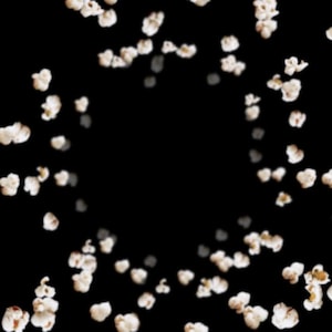 May include: A black background with white popcorn kernels scattered throughout the image. The popcorn is arranged in a circular pattern, creating a swirling effect.