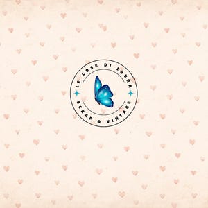May include: A cream-colored background with a pattern of small pink hearts. In the center is a circular logo with the text "LE COSE DI LAURA SCRAP & VINTAGE" around a blue butterfly illustration.