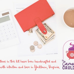 May include: A red leather wallet containing cash and coins, a white calculator, a cup of coffee, and a logo for The Carnelian Cauldon, which features a red cauldron with purple smoke and a pentagram. The text reads "The Carnelian Cauldon".