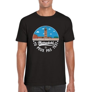 May include: Black t-shirt with a vintage-style graphic of a mosque in Marrakech, Morocco. The graphic includes the text "Marrakeschi Tu Peux Pas Test".