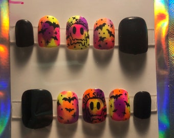Stay spooky tie dye nails