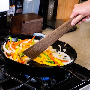 13 inch spatula at use sautéing veggies in cast iron skillet