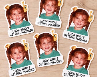 May include: Five identical die-cut stickers featuring a photograph of a young child with brown hair in pigtails tied with yellow ribbons, wearing a green shirt. Below the child, the text reads LOOK WHO'S GETTING MARRIED in black capital letters.