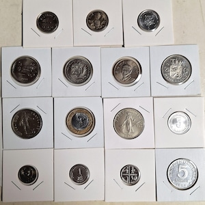 15 Uncirculated random world coins from huge collection in excellent condition, guaranteed no duplicates with coin protection case included!