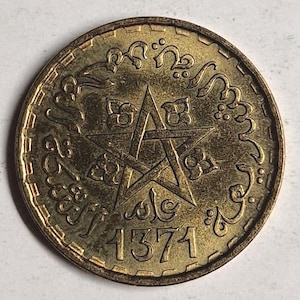 Moneda marroquí de 10 francos de 1952, sin circular. La moneda que ves es la que recibes.