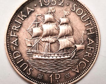 Penique grande sudafricano de 1952, en buen estado.