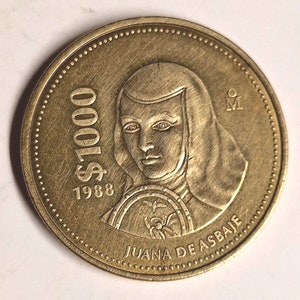 1,000 peso Mexican coin In good condition! The coin you see is the coin you get.