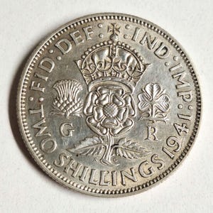 1941 United Kingdom silver two shilling coin in excellent condition! The coin you see is the coin you get!