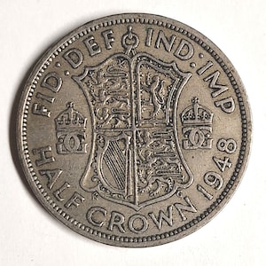 King George VI, 1948 United Kingdom Half crown coin in excellent condition! This is a US half dollar size coin.