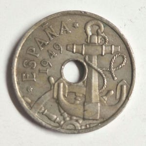 Spanish 1949, 50 centimos coin in good condition. The coin you see is the coin you get!