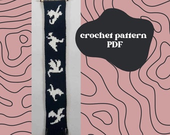 Motif au crochet de tapisserie dragon avec bords au pochoir