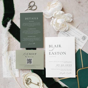 May include: Wedding invitation suite featuring a white invitation card with the names "Blair and Easton" and event details. Includes RSVP, details, and accommodation cards in green. Decorative elements include white flowers and a vintage key.