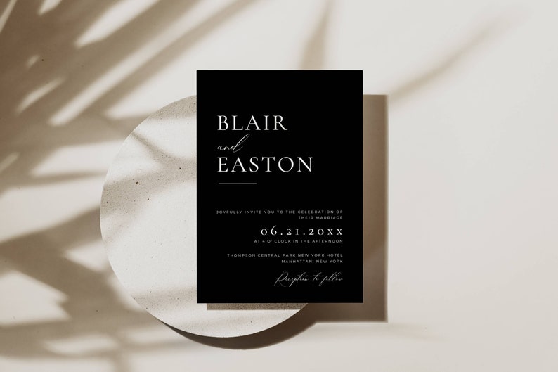 May include: Black wedding invitation with white text. The invitation reads "Blair and Easton" with a line under Easton. The date is June 21, 20XX at 4 o'clock in the afternoon. The location is Thompson Central Park New York Hotel, Manhattan, New York. The invitation also includes the text "Reception to follow".