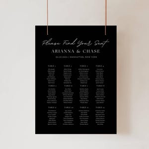 May include: Black and white wedding seating chart with the text "Please Find Your Seat" and "ARIANNA & CHASE" with the date "04.22.2024" and location "MANHATTAN, NEW YORK". The chart lists guest names by table number.